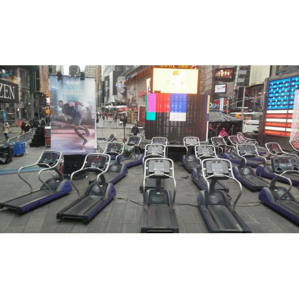 A group of treadmills, including new and remanufactured gym equipment, on a street in Times Square. A group of treadmills, including new and remanufactured gym equipment, on a street in Times Square.