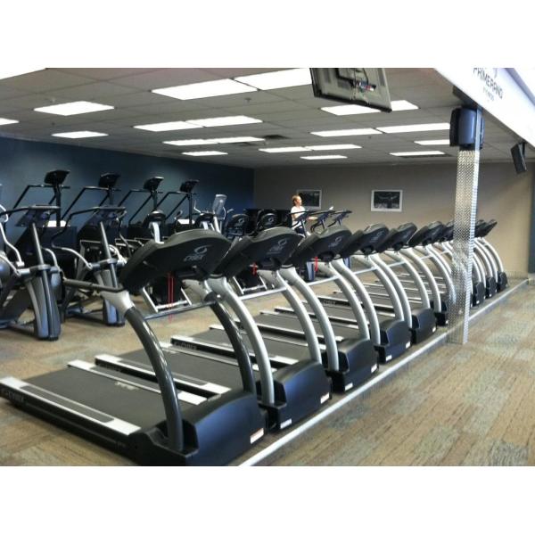 A selection of new and remanufactured treadmills in a gym. A selection of new and remanufactured treadmills in a gym.