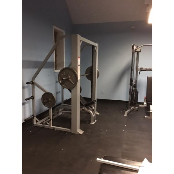 A gym room with new weights and remanufactured equipment. A gym room with new weights and remanufactured equipment.