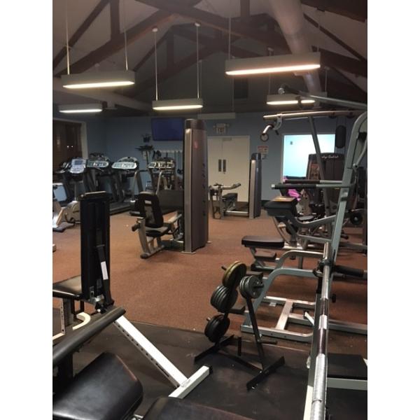 A gym with a wide variety of new and remanufactured machines and weights. A gym with a wide variety of new and remanufactured machines and weights.