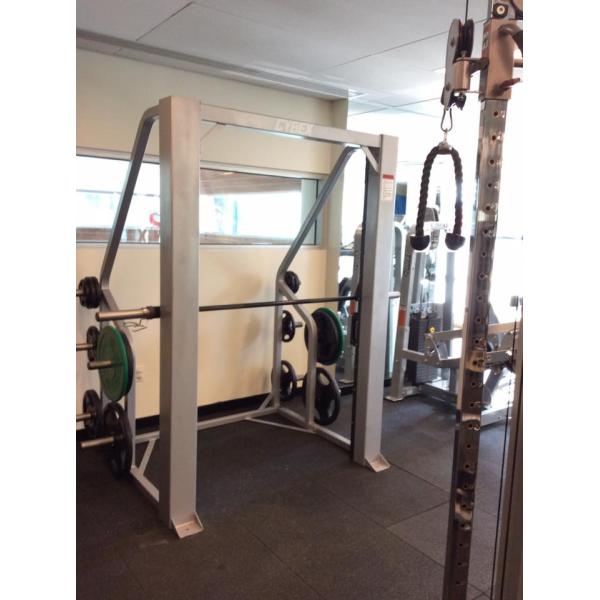 A gym with a new squat rack and other remanufactured equipment. A gym with a new squat rack and other remanufactured equipment.