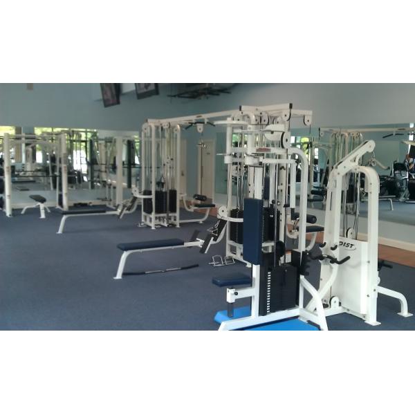A gym with multiple exercise equipment options including new and remanufactured gym equipment.
