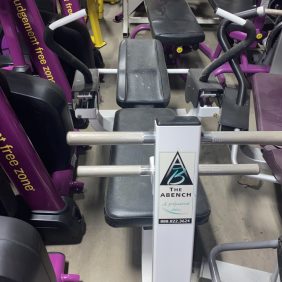 A group of The Abs Co. The Abs Bench - As Is Functional gym equipment, including both new and remanufactured pieces, can be found in this gym.