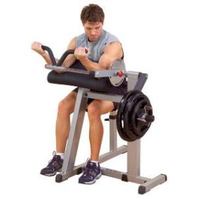 A man using the Body-Solid Cam Series Plate Loaded Arm Curl & Extension Machine - New to perform a bicep curl.