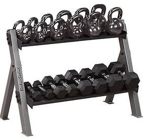 A rack with several Body Solid Dumbell/Kettleball Rack - New kettlebells and weights on it.