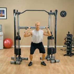 A man exercising on a Body Solid Functional Training Center 200 - New.
