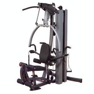 A new Body Solid FUSION 600 Personal Trainer 210lbs Stack - New gym equipment set with a bench and a pulley.