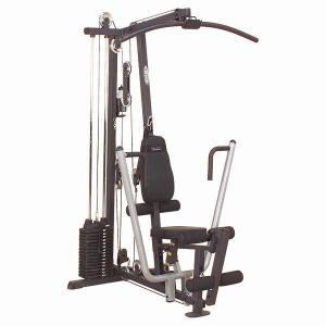 A new Body Solid G1S Selectorized Home Gym - New with a squat bar and a pulley.