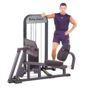 A man is standing next to a Body Solid Selectorized Leg and Calf Press Machine - New.