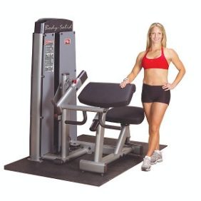 A woman using the Body Solid Selectorized Pro Dual Bicep Tricep Machine - New.