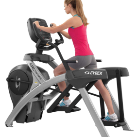 A woman using a Cybex 770a Lower Body Arc Trainer w/Standard Console - Remanufactured.