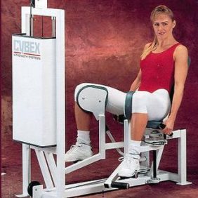 A woman exercising on a Cybex Classic Selectorized Adductor - Remanufactured exercise machine.