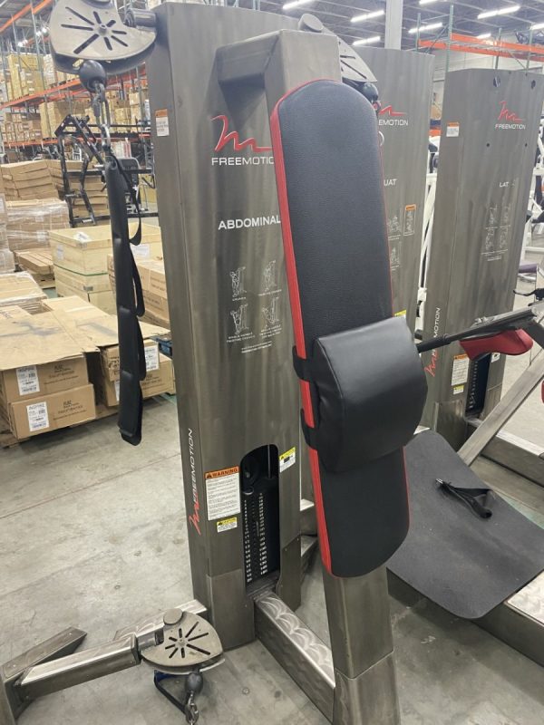 A warehouse stocked with a selection of new and remanufactured Freemotion 12-Piece Circuit - As Is Functional - 12 Units/12k Package gym equipment, including a variety of cutting-edge gym machines.