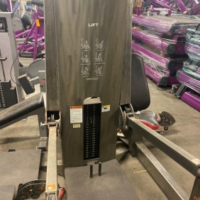 A gym with a Free Motion- Lift - Remanufactured machine in the middle of it.