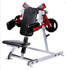 A gym machine with a red and black seat, available as new or remanufactured, such as the Hammer Strength Plate Loaded Lateral Raise - Remanufactured.