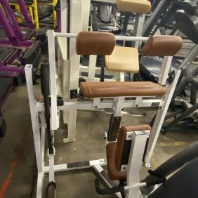 A group of Hammer Strength Tricep Extension - As Is Functional equipment in a gym.