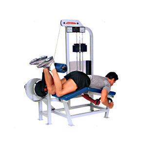 A man is using a Life Fitness PRO Prone Leg Curl - Remanufactured machine to stretch his legs.