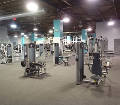 A large gym offering a wide range of new and remanufactured exercise equipment.