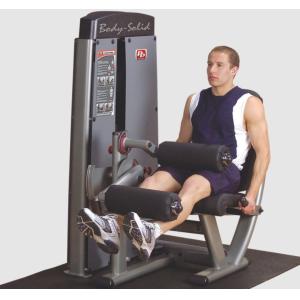 A man is sitting on a Body Solid DLEC-SF Pro Dual Leg Extension/Curl Machine.