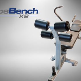The Abs Bench X2 is shown on a gray background and is available as remanufactured gym equipment.