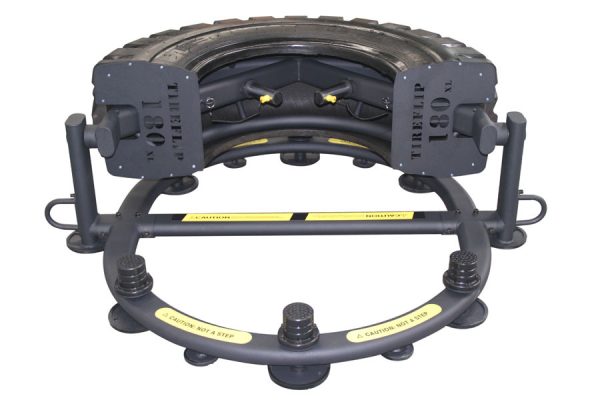 A new black frame with a TireFlip180XL attached to it.