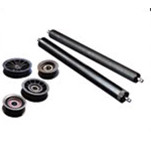 A group of new and remanufactured black rollers and rollers for gym equipment. A group of new and remanufactured black rollers and rollers for gym equipment.