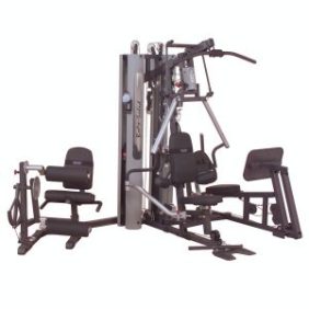 A gym set with a bench and other New equipment.