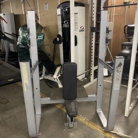 A room filled with new and remanufactured Precor Oly Military Bench - As Is Functional gym equipment.